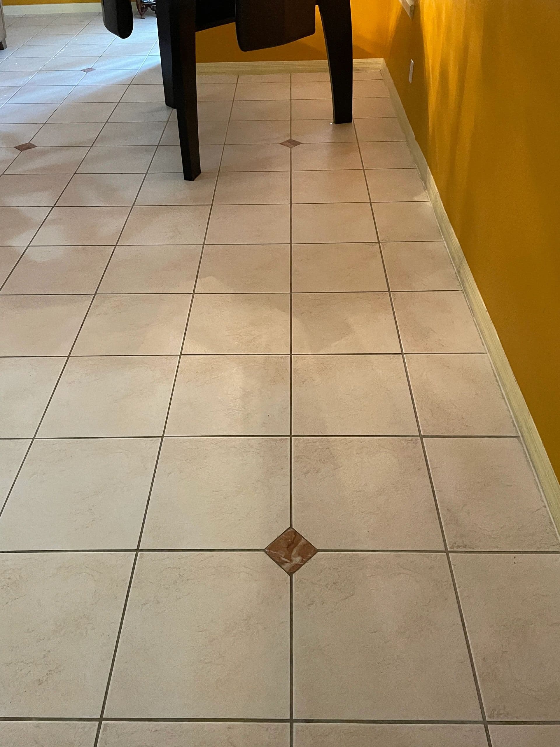 Tile floor color seal · Central Florida, before