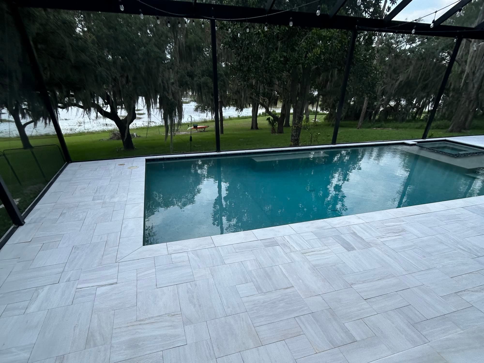Sandblasted marble pool deck cleaned, re-sanded and sealed by Best Cleaning & Restoration near Orlando, Florida